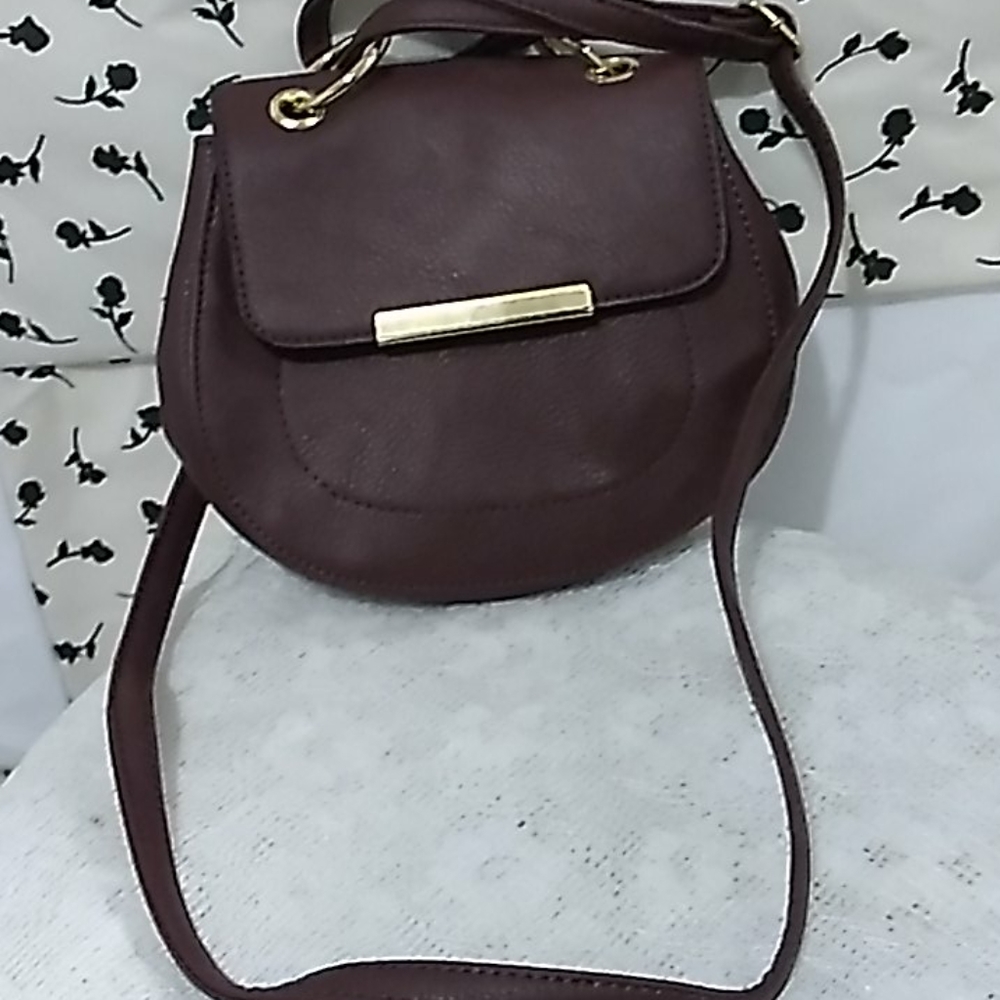 Pretty dark purple over the shoulder pursy